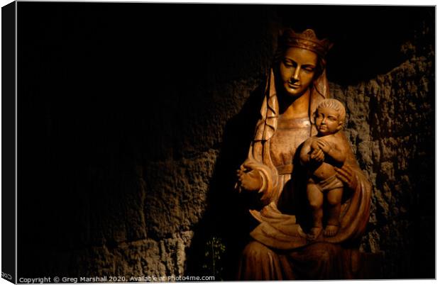 Madonna and Jesus statue illuminated Canvas Print by Greg Marshall