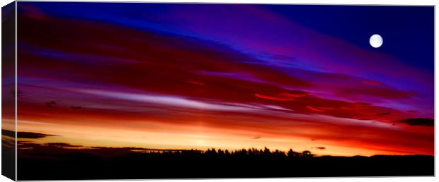 Sunset and The Moon Canvas Print by Kevin Dobie