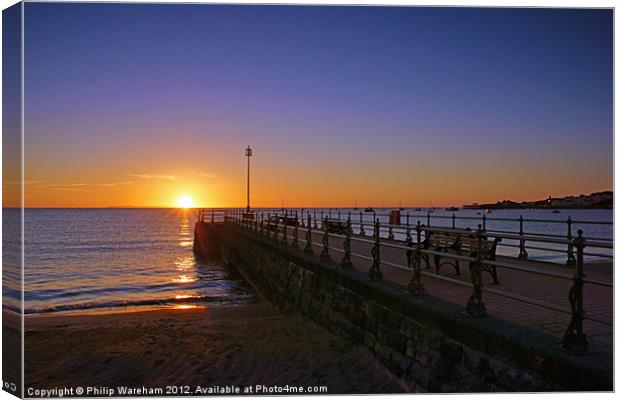 Sunrise over Swanage Bay Canvas Print by Phil Wareham
