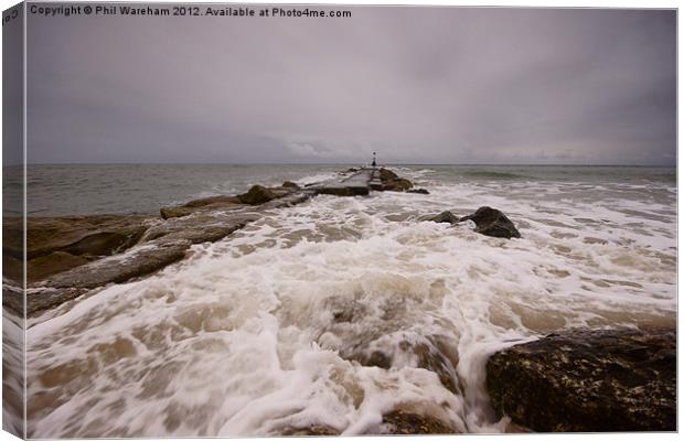 Wave on the breakwater Canvas Print by Phil Wareham