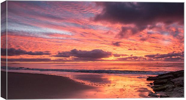 Across the bay at sunrise Canvas Print by Phil Wareham