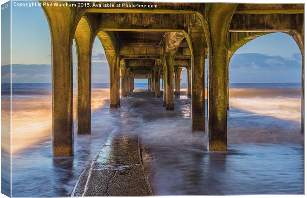  Under the pier at Boscombe Canvas Print by Phil Wareham
