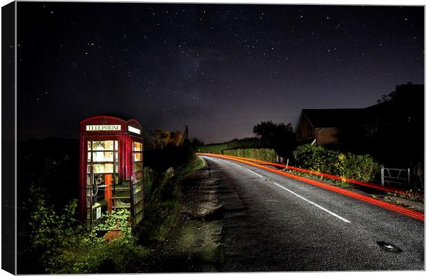 Rundown Phonebox By Night Canvas Print by Malcolm Wood