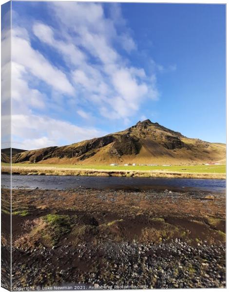 Mountain at Skógafoss, Iceland Canvas Print by Luke Newman