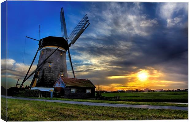  Beautiful sunrise over a windmill Canvas Print by Ankor Light