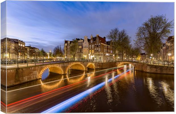 Amsterdam canal by night Canvas Print by Ankor Light