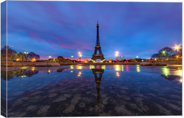 Sunrise on the Eiffel tower reflection Canvas Print by Ankor Light