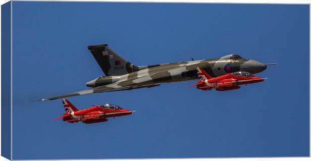  Red 6 and Red 8 Escort the XH558 the Avro Vulcan Canvas Print by stuart bennett