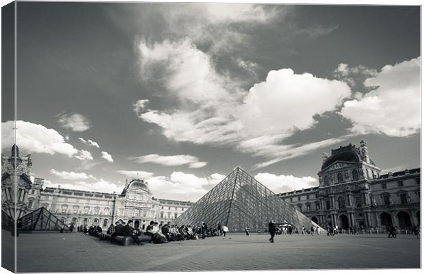 Louvre pyramid Canvas Print by Daniel Zrno