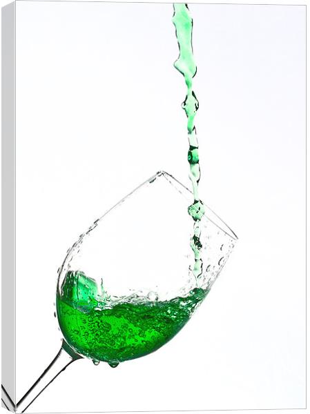 A glass of Green sparkling water Canvas Print by Dave Frost