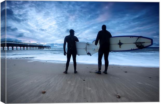 Surfers at Dawn Boscombe Pier Canvas Print by Jennie Franklin