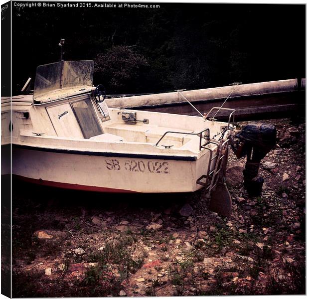  Abandoned Boats at Lake Guerlédan, Bretagne, Fran Canvas Print by Brian Sharland