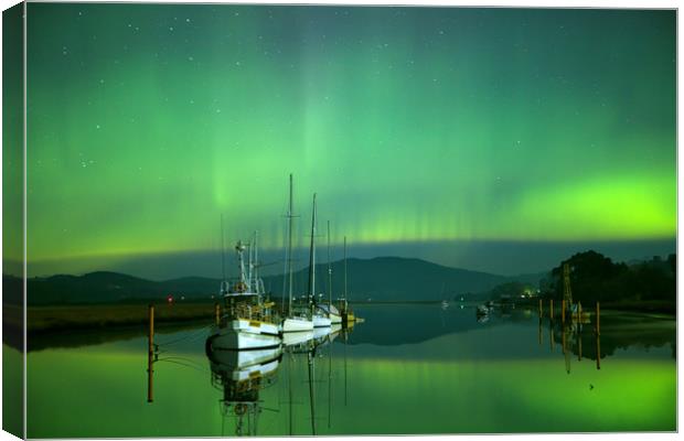 Boats and the southern lights Canvas Print by Matthew Burniston