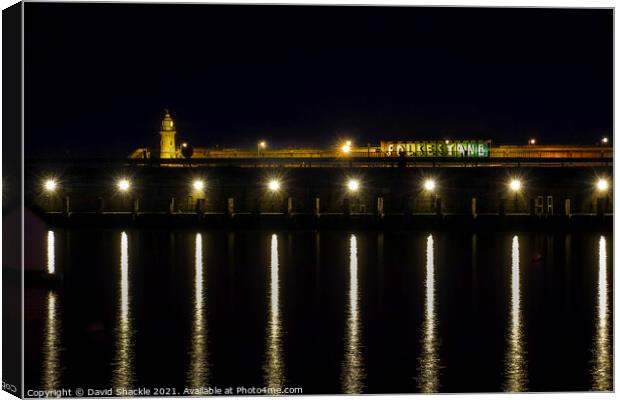 Nightscape of Folkestone Harbour Arm & Lighthouse Canvas Print by David Shackle