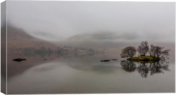 Misty Isle Canvas Print by Gary Finnigan