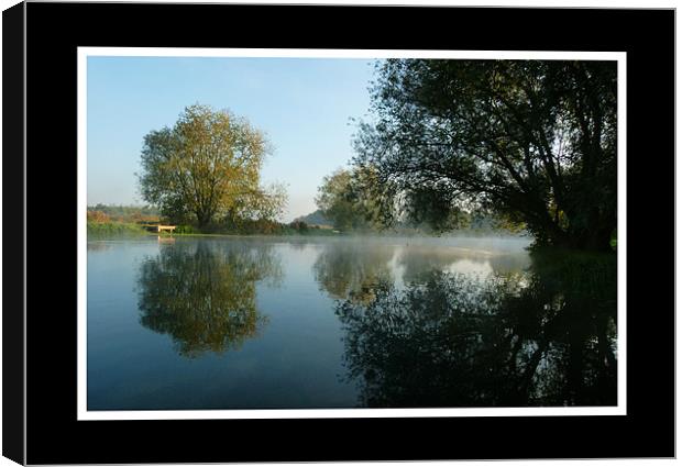 Misty River Reflections Canvas Print by Simon Deacon