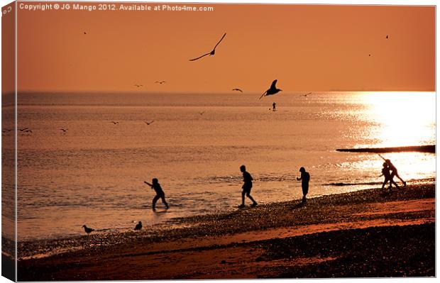 Boys Playing in Sunset Canvas Print by JG Mango