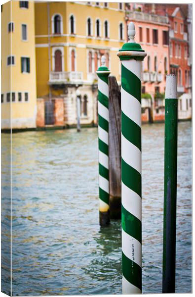Green and White poles in Venice Canvas Print by Steve Hughes