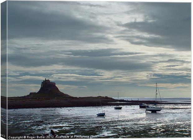 Lindisfarne Castle after a Shower Canvas Print by Roger Butler