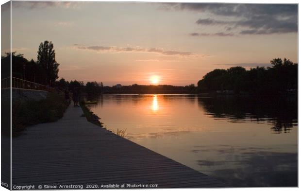 Sunset over the River Allier, Vichy Canvas Print by Simon Armstrong
