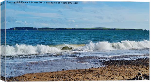 Caldey Isand viewed from South Beach Canvas Print by Paula J James