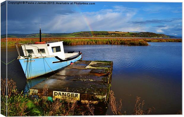 The Boat and the Rainbow Canvas Print by Paula J James