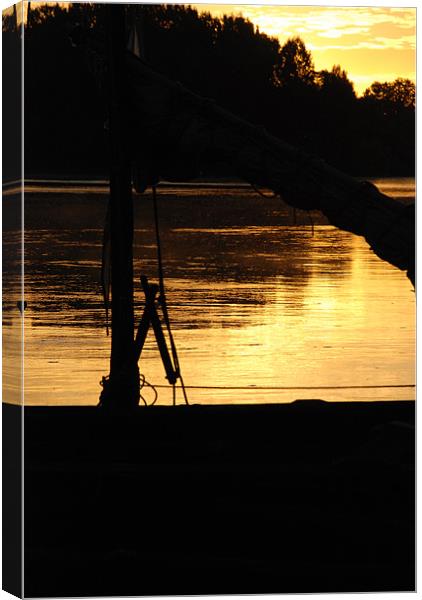 Boat at Sunset Canvas Print by Bob Clewley