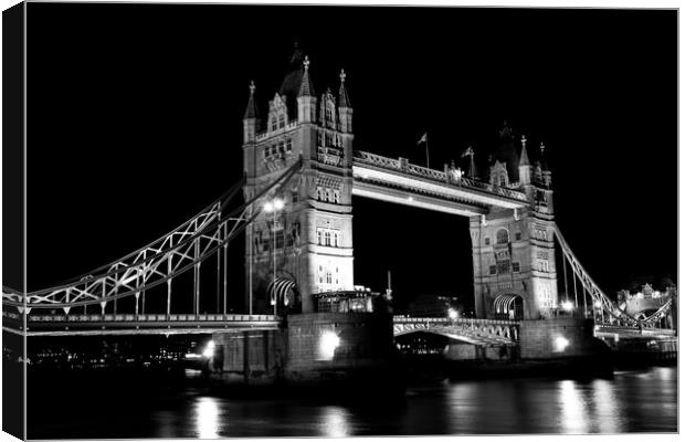 Tower Bridge At Night Canvas Print by David Pyatt