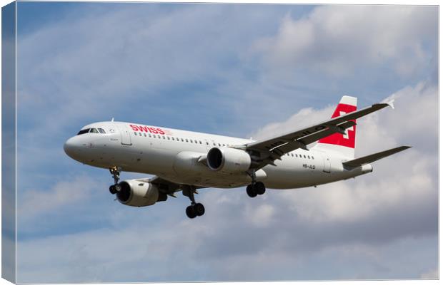 Swiss Airlines Airbus A320 Canvas Print by David Pyatt