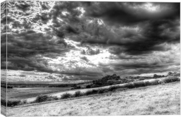 Storm Over The hill Canvas Print by David Pyatt