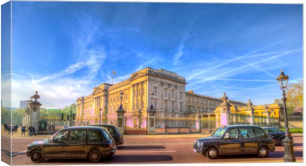 Buckingham Palace And London Taxis Canvas Print by David Pyatt