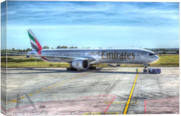 Emirates Boeing 777-300ER Canvas Print by David Pyatt