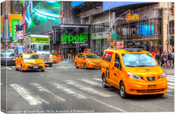 New York Taxis  Canvas Print by David Pyatt