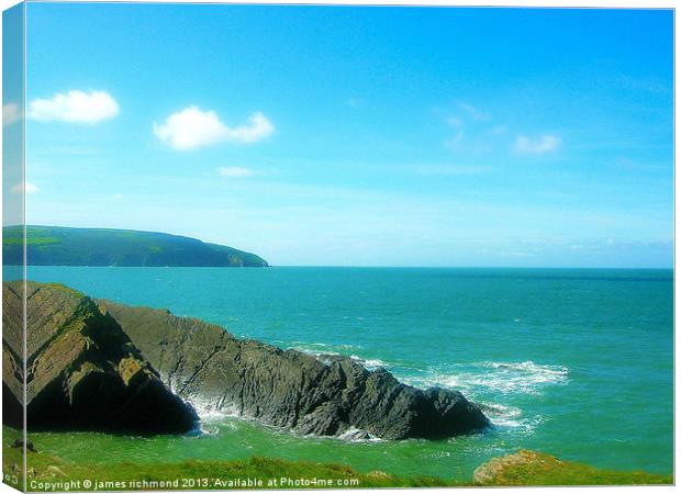 Black Rocks of Cardigan Bay Canvas Print by james richmond