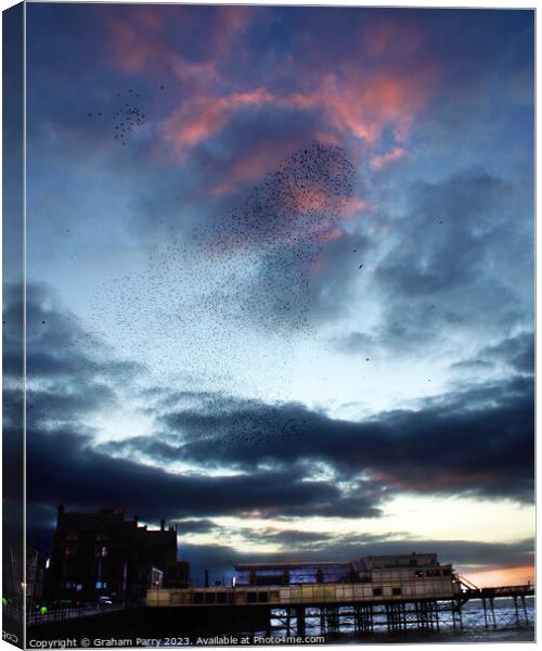 Starling Spectacle Over Aberystwyth Pier Canvas Print by Graham Parry