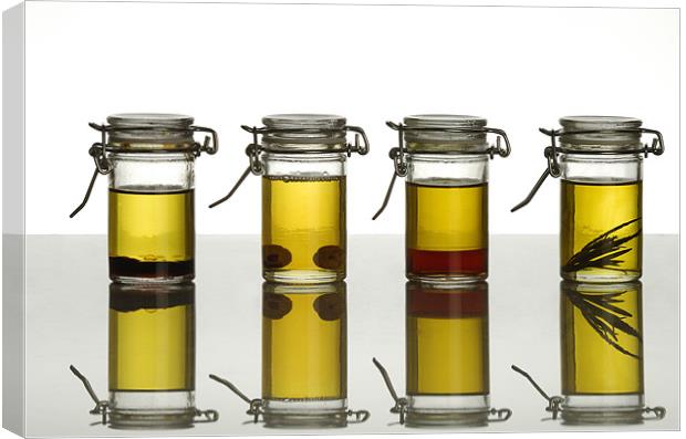 aromatic olive oils over white Canvas Print by Josep M Peñalver