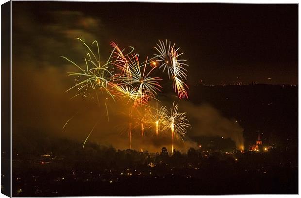 Brockham Fireworks And Church Canvas Print by Clive Eariss