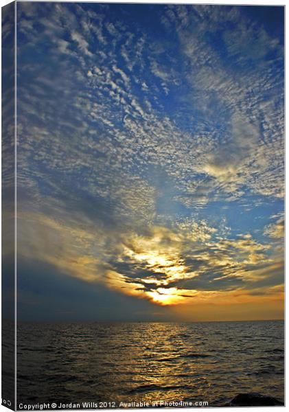 sunset at sea Canvas Print by Jordan Wills