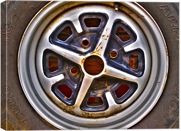Old Rostyle wheel Canvas Print by andrew hall