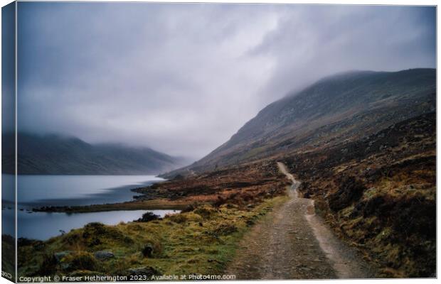 Misty Loch Turret Canvas Print by Fraser Hetherington