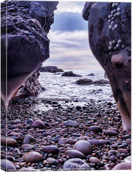 Rock Framed Beach Canvas Print by Fraser Hetherington