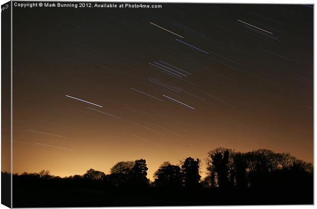 Star trails at night Canvas Print by Mark Bunning