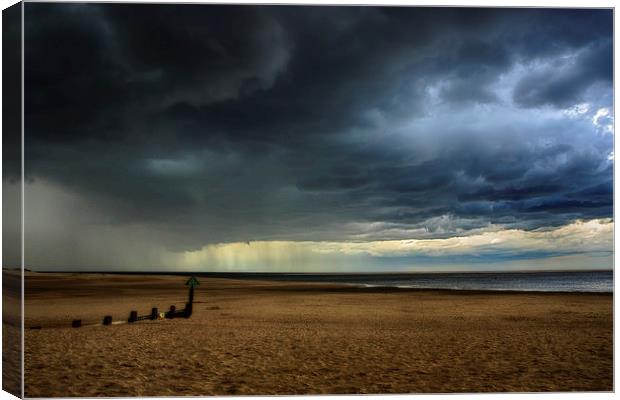 Storm clouds over Wells beach Canvas Print by Mark Bunning
