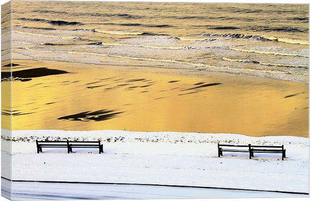  Whitby Sun. Sea, Sand and Snow Canvas Print by Paul M Baxter
