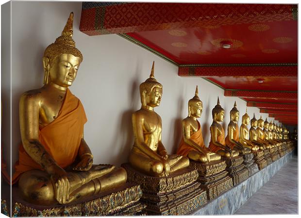 Seated Buddhas in Bangkok Canvas Print by Sarah Bonnot