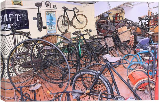 A Muddle of Old Bicycles Canvas Print by Julie Ormiston