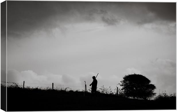 Man Walking With Shotgun Canvas Print by Chris Martin