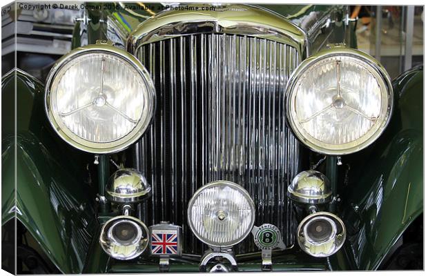  Headlight and badges on vintage Bentley Canvas Print by Derek Corner