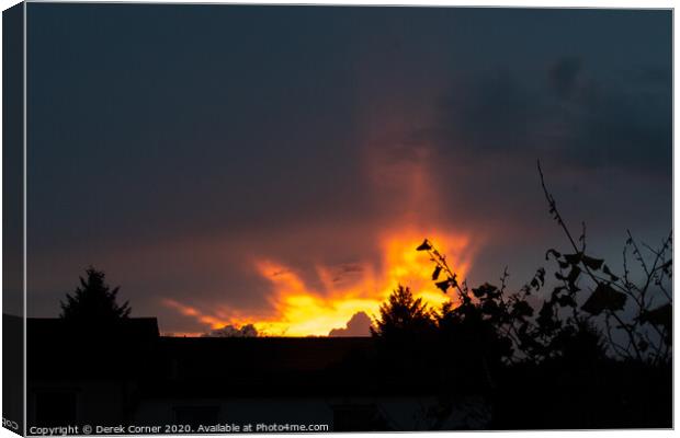 Sunset clouds over Cumbernauld Canvas Print by Derek Corner