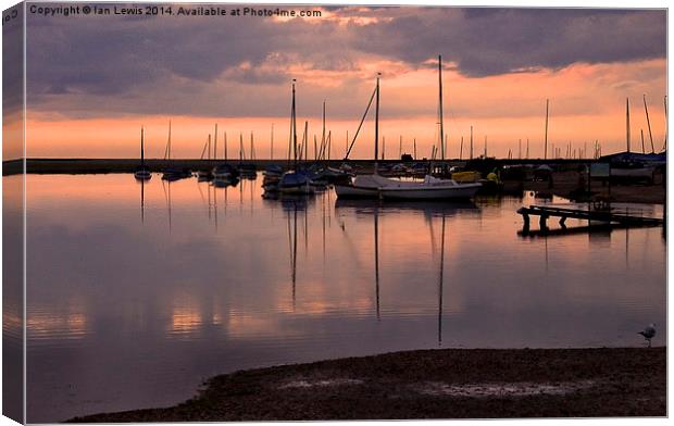 Evening at Blakeney Quay Canvas Print by Ian Lewis